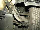 Closeup of the left front wheel (from the front) suspension.